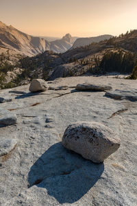 Scenic view of land against sky during sunset