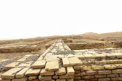 Empty road along landscape