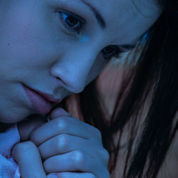 Close-up portrait of woman looking away