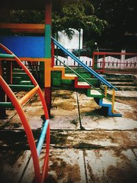 Empty railing with railings in background