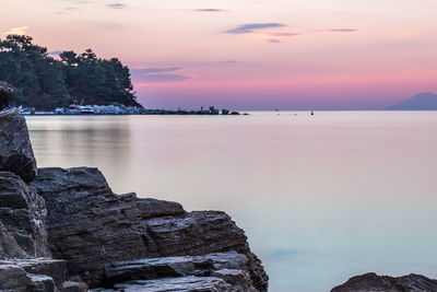 Scenic view of sea against sky at sunset