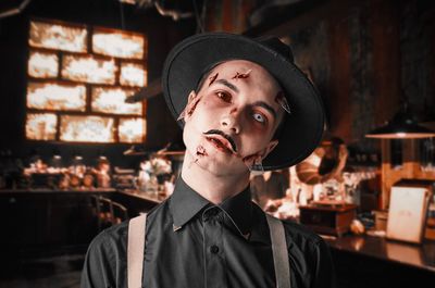 Portrait of young man with halloween make-up