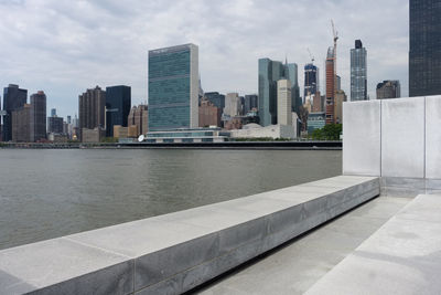 Modern buildings in city against sky