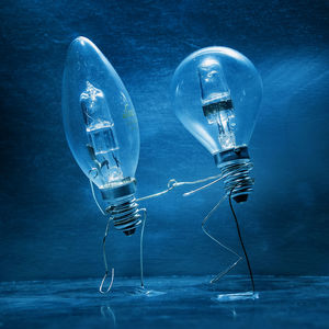 Close-up of light bulbs on table