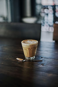 Glass of coffee on table