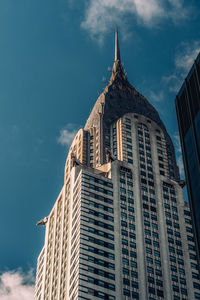 Low angle view of modern building against sky