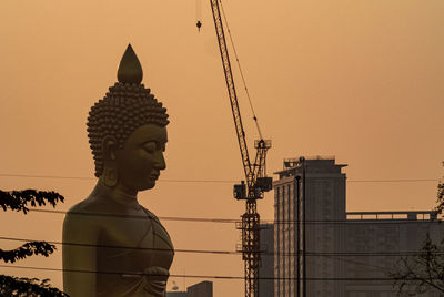 The giant golden buddha in wat paknam phasi charoen temple in phasi charoen district