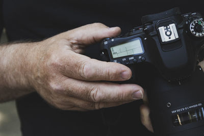 High angle view of man using camera