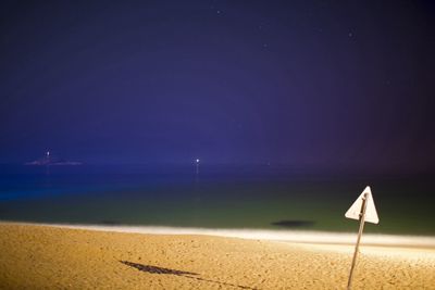 Scenic view of sea at night