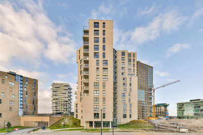 Low angle view of modern buildings against sky