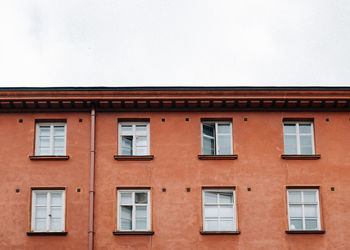 Low angle view of residential building against clear sky