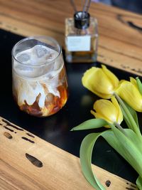 High angle view of wine in glass on table