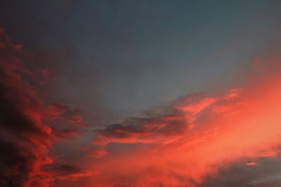 Low angle view of dramatic sky at night