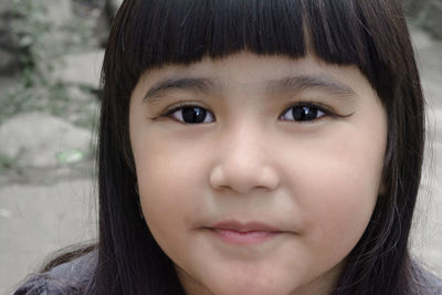 Close-up portrait of smiling girl