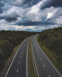 Road amidst landscape against sky