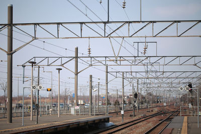 Electricity pylons at railroad station