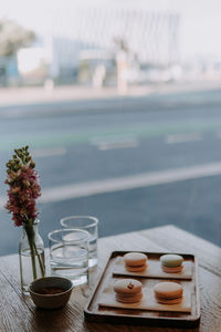 Flower vase on table against blurred background