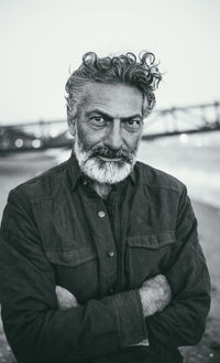 Portrait of man standing outdoors