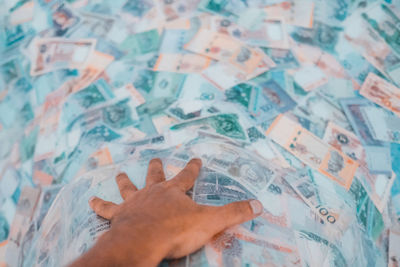 High angle view of hand painting on wall