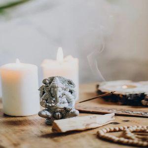 Close-up of candles on table