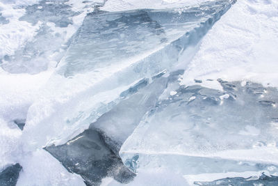 Broken ice in frozen lake at lake baikal, russia