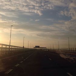 Road against sky at sunset