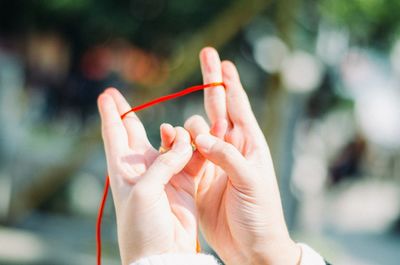 Close-up of hand holding hands