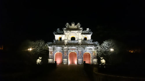 Illuminated building at night