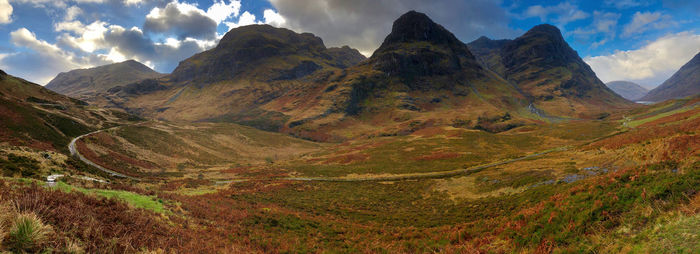 View of mountain range against cloudy sky