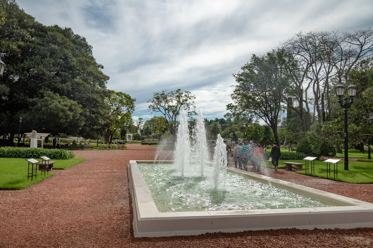 plant, tree, water, nature, fountain, cloud, estate, sky, garden, no people, spraying, backyard, architecture, water feature, park, outdoors, day, park - man made space, reflecting pool, grass, travel destinations, lawn, memorial, formal garden, beauty in nature