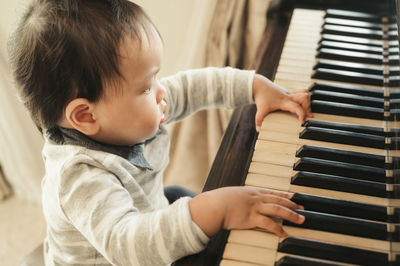 Boy playing piano