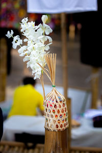 Close-up of flower vase on table