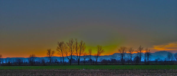 Scenic view of landscape at sunset