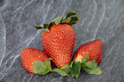 Close-up of strawberries on slate