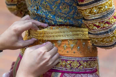 Midsection of woman wearing mask