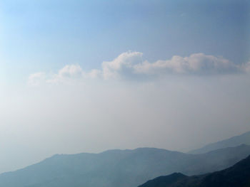 Low angle view of mountain range against sky