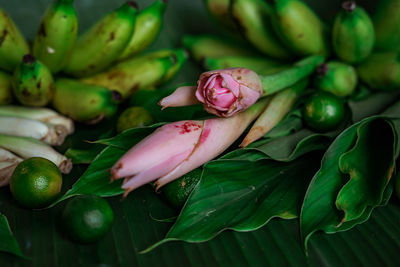 Asian food ingredient bunga kantan or torch lily, calamansi, lemongrass, tumeric leaves and bananas.
