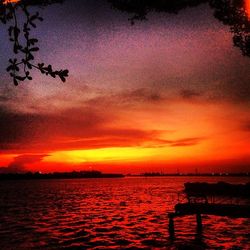 Scenic view of lake at sunset