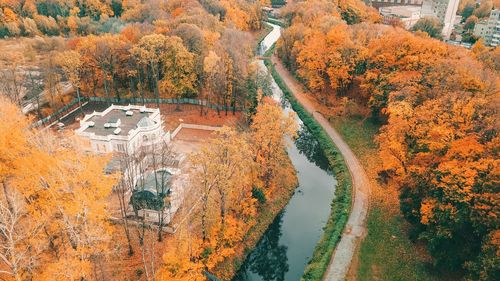 High angle view of trees by building during autumn