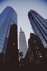 Low angle view of buildings against clear sky