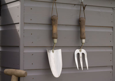 Close-up of clothes hanging on wood