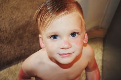 Close-up portrait of cute shirtless boy