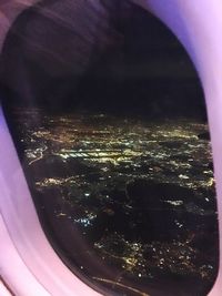 Low angle view of airplane wing seen through window