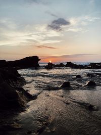 Scenic view of sea against sky during sunset