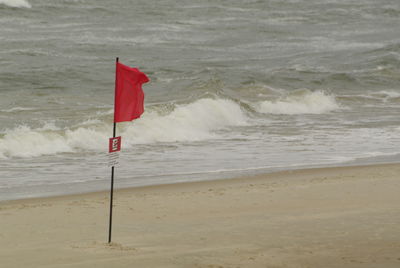 Red umbrella on beach