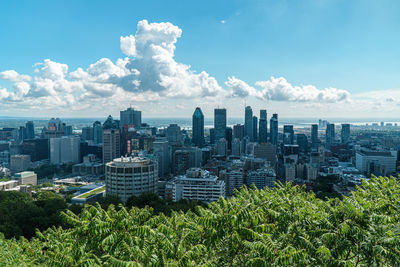 Panoramic shot of city buildings against sky