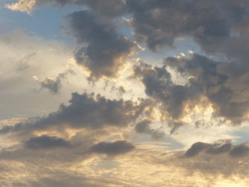 Low angle view of clouds in sky during sunset