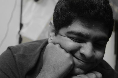 Close-up of baby boy with hands