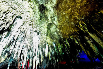 Low angle view of water flowing in cave