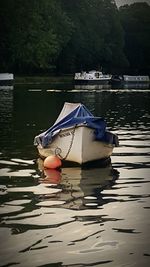 Boats in calm lake